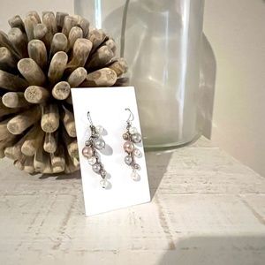 Faux pearl earrings on silver